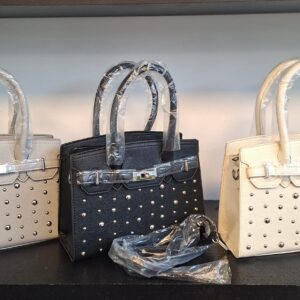 studs tas