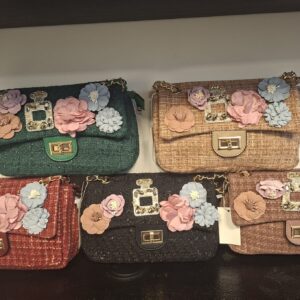 Schoudertas met geurflesje en bloem