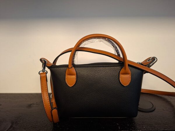 klein draagbaar tasje